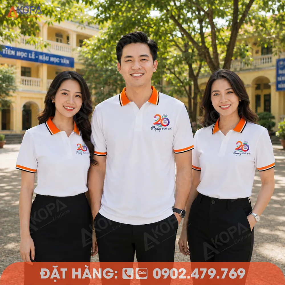 Mẫu áo đồng phục họp lớp 20 năm màu trắng phối cam nổi bật, thiết kế polo hiện đại và trẻ trung.