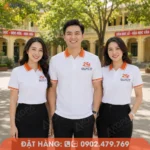Áo đồng phục họp lớp màu trắng viền cam nổi bật, thiết kế polo trẻ trung dành cho kỷ niệm 25 năm.