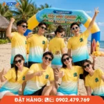 Áo phông đồng phục nhóm thiết kế trẻ trung với tông vàng xanh, lý tưởng cho teambuilding, du lịch biển, sự kiện và hoạt động gắn kết đội nhóm.