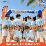 Áo phông đồng phục nhóm màu xanh nhạt với họa tiết Let's Go Travel dành cho 10 thành viên tham gia du lịch biển và teambuilding.
