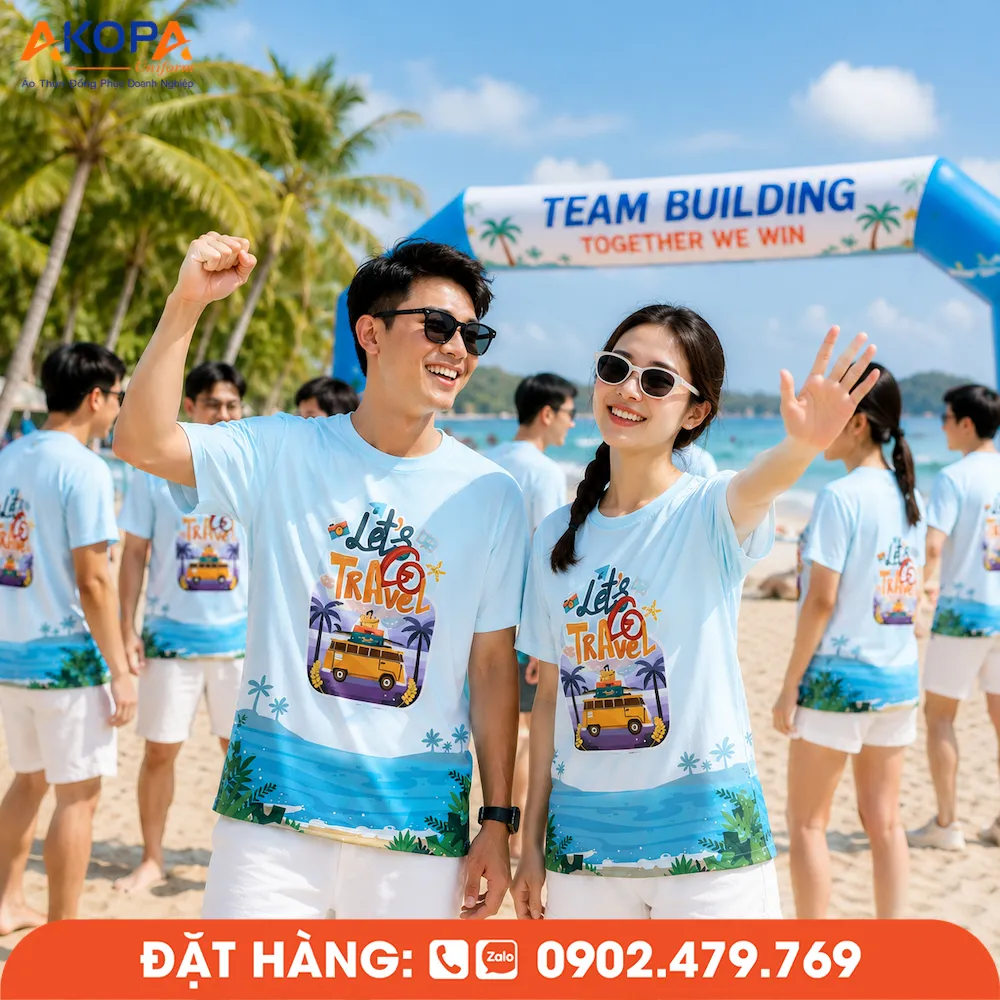 Áo phông đồng phục nhóm thiết kế Let's Go Travel màu xanh nhạt, lý tưởng cho teambuilding, du lịch biển, sự kiện và các hoạt động gắn kết tập thể.