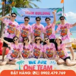 Áo phông đồng phục nhóm màu hồng loang thiết kế trẻ trung, phù hợp teambuilding, du lịch biển, sự kiện và hoạt động gắn kết đội nhóm.
