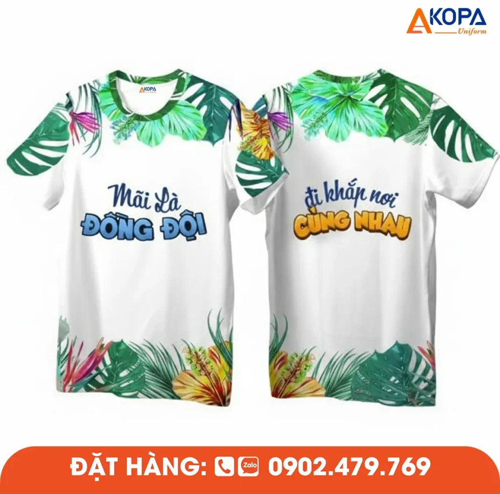 Áo phông đồng phục nhóm thiết kế họa tiết lá nhiệt đới cùng slogan ý nghĩa “Mãi là đồng đội”, phù hợp cho du lịch, teambuilding và hoạt động gắn kết nhóm.
