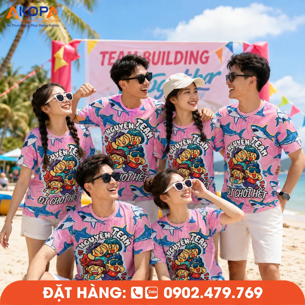 Áo phông đồng phục nhóm màu hồng thiết kế Nguyên Team Đi Chơi Hết, phù hợp teambuilding, du lịch biển, dã ngoại và các hoạt động gắn kết đội nhóm.