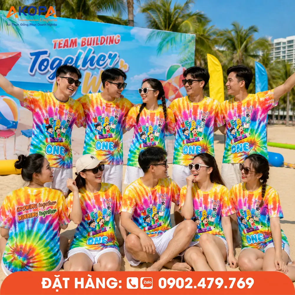 Áo phông đồng phục nhóm We Are One màu cầu vồng thiết kế trẻ trung, phù hợp teambuilding, du lịch biển, dã ngoại và các hoạt động gắn kết đội nhóm.