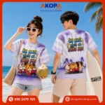 Áo phông nhóm đi biển màu tím pastel nổi bật với slogan "Ăn chơi phải có đồng bọn", thiết kế trẻ trung, in trước – sau đồng bộ, thích hợp cho du lịch, dã ngoại và team building.