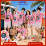Mẫu áo nhóm đi biển màu hồng nổi bật với thông điệp "We Are One", mang đến phong cách trẻ trung, năng động và gắn kết cho mọi chuyến đi.