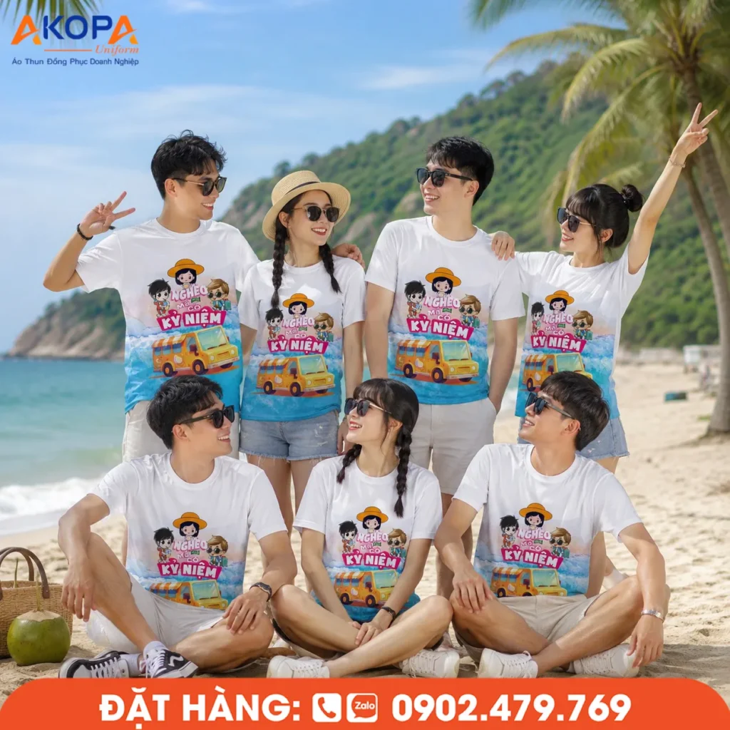 Áo đồng phục team building màu trắng in họa tiết du lịch nổi bật, thiết kế trẻ trung, dễ phối đồ, thích hợp cho nhóm bạn, gia đình và doanh nghiệp trong các chuyến đi biển, nghỉ dưỡng và hoạt động tập thể.