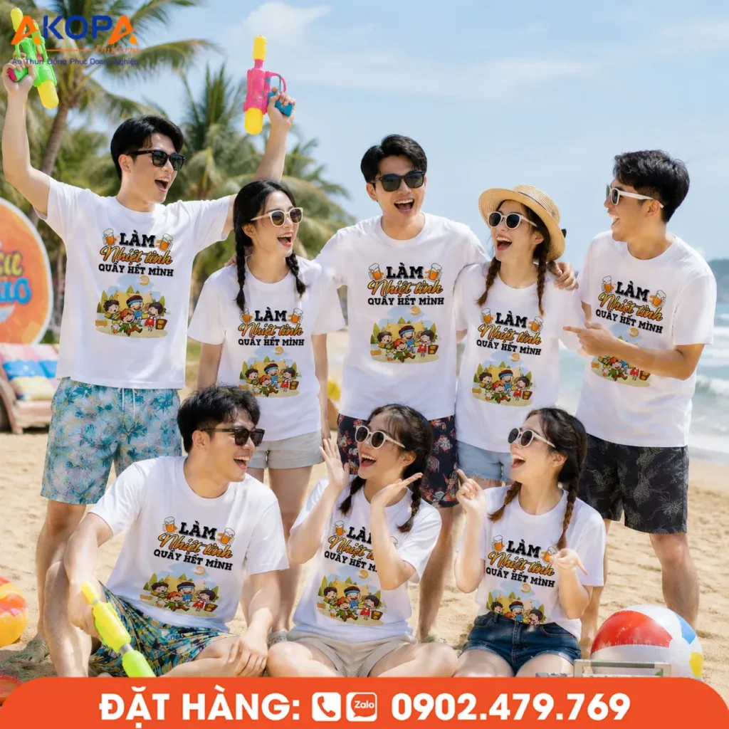 Áo team building hài hước với slogan "Làm nhiệt tình, quẩy hết mình", thiết kế năng động, hình in sắc nét và chất vải thoáng mát, giúp tập thể nổi bật trong các chuyến du lịch biển, team building và hoạt động gắn kết đồng đội.