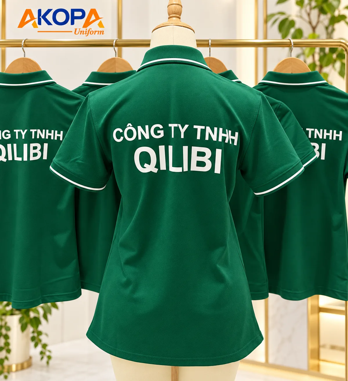 Áo polo đồng phục công ty màu xanh lá in tên công ty sau lưng – AKOPA